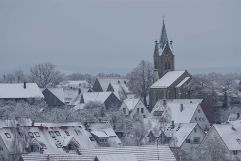 Snow-covered village church in Bibersfeld, Swabian-Franconian Forest nature park Park, Bibers,