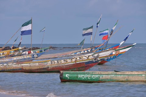 Colourful fishing boats, Mama Beach, near Kent, Western Area, Sierra Leone, Africa