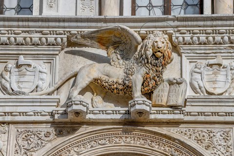 Winged lion in the courtyard of the Doge's Palace, San Marco district, Venice, Veneto region,