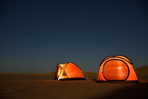 Tents in the Nubian Desert in the evening light, near Dongola, Northern State, Nubia, Sudan, Africa