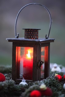 Lantern with burning candle, Christmas decoration