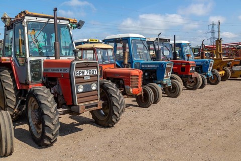 Old tractors lined up for sale at auction, Campsea Ashe, Suffolk, England, UK