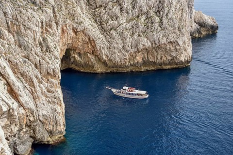 Tourboat at Neptune Grotto, Grotta di Nettuno, Parco Naturale Regionale di Porto Conto, near