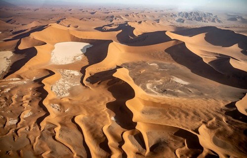 Aerial view, red sand dunes of Sossusvlei, Deadvlei salt pan and Daddy Dune from above, Namib