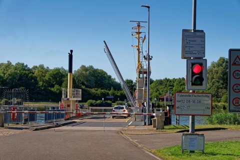 Pier of the canal ferry Fischerhütte on the Kiel Canal. Fischerhütte, Steenfeld,