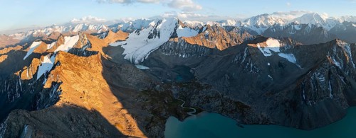Evening mood, mountain panorama, aerial view, 4000 metre peak with glacier, mountain pass and