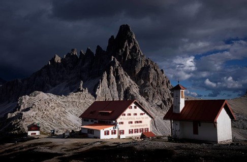 Stormy atmosphere, view of Dreizinnenhütte, chapel, Paternkofel, South Tyrol, Trentino, Sesto