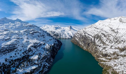 Aerial view over the Zervreila reservoir with the Zervreilahorn in the background, Valsertal,
