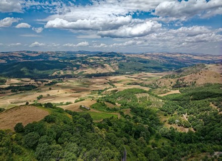 Aerial view of the varied hilly landscape of Basilicata in the north of the Italian province of