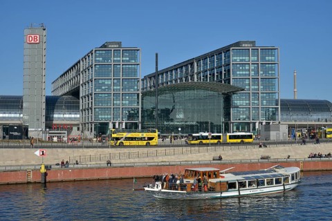 Excursion boat on the Spree River in front of Berlin Hauptbahnhof main railway station, Berlin,