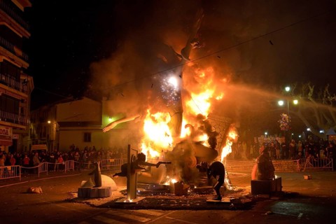 A burning Falla, a papier-mâché figure, at the Falles or Fallas spring festival, Pego, Province of