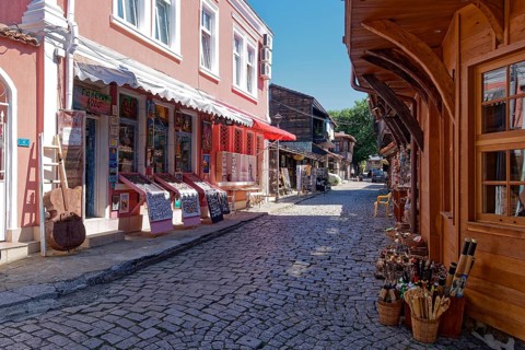 Half-timbered houses with typical local roof overhangs in the old town centre of Sozopol. Bulgaria,