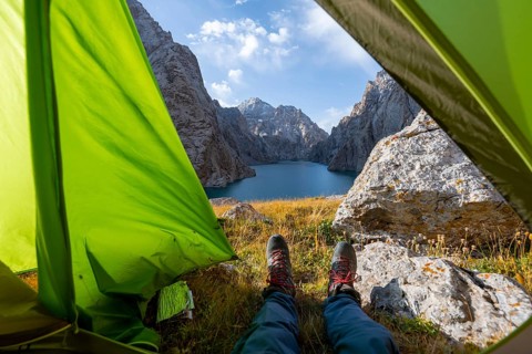 Wild camping, camping in the wilderness with a tent, Kol Suu mountain lake, Sary Beles Mountains,