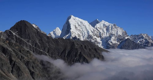 Sea of fog in the Gokyo Valley and peaks of Ama Dablam, Cholatse and Tobuche