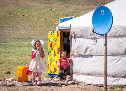 Nomad kids out of yurt looking at me. Summer time in Gobi-Altai province8 Mongolia