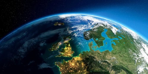 Highly detailed Earth with atmosphere, exaggerated relief and light-flooded cities. Transition from