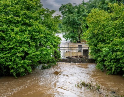Landscape with a flooded bridge after heavy rain in Schrobenhausen