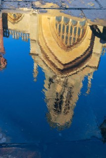 YORK, NORTH YORKSHIRE/UK - FEBRUARY 20 : Reflection of St Helen Stonegate church in a puddle in