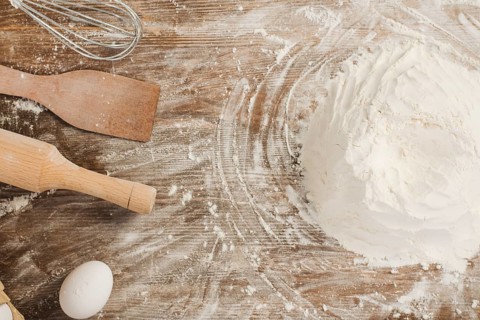 Top view flour wooden surface. Beautiful photo