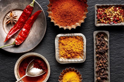 Assortment spices with clove chili peppers