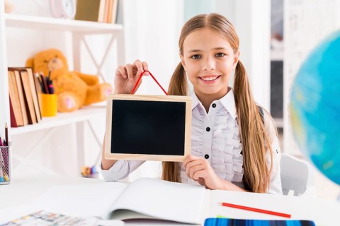 Cheerful schoolgirl uniform studying class