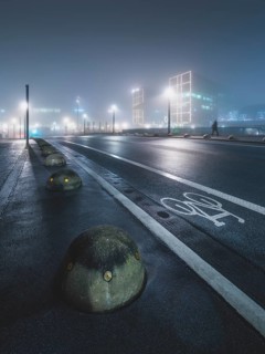 Empty street with Berlin main station in the fog, night, Berlin, Germany, Europe