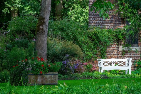 White garden bench, Welbergen, Münsterland, North Rhine-Westphalia, Germany, Europe
