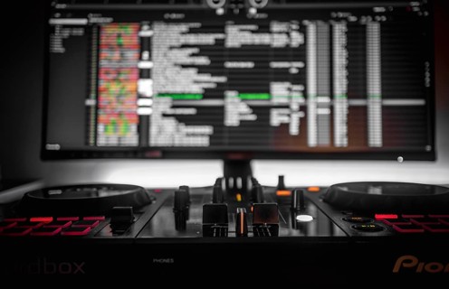 Dj console and monitor, bokeh, Pioneer DJ