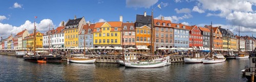 Copenhagen, Denmark, August 21, 2019: Panoramic view of the famous Nyhavn district in the city