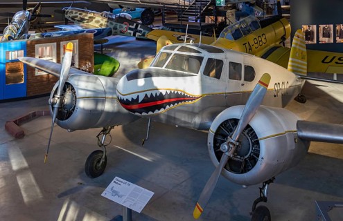 A picture of the Cessna UC-78A Bobcat inside the main hangar of the Polish Aviation Museum