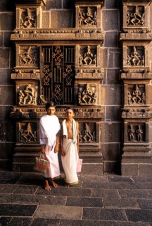 Dikshitar boys in front of karna sculptures in Thillai Nataraja temple in Chidambaram, Tamil Nadu,