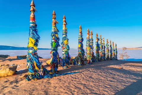Shaman totem poles at Cape Burkhan on Olkhon Island in Lake Baikal, Russia, Europe