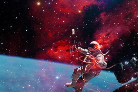 Astronaut. Nebula, cluster of stars in deep space. Science fiction art. Elements of this image