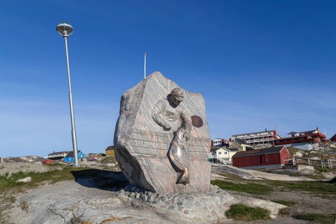 Ilulissat, Greenland, June 30, 2018: Monument commemorating long line fishing and halibut, North
