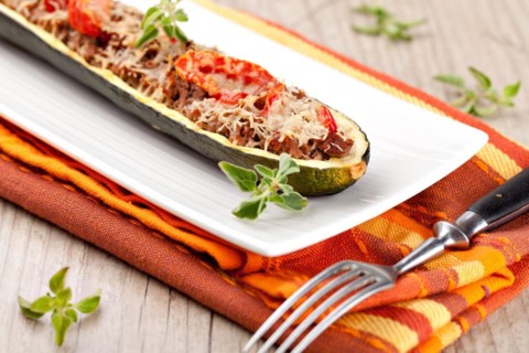 Zucchini halves stuffed with minced meat and vegetable