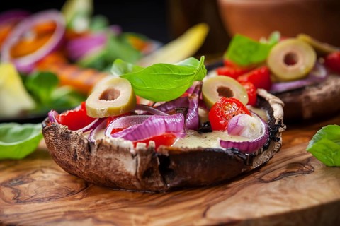 Giant Portobello mushrooms stuffed with mozzarella and tomatoes