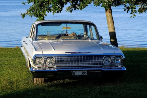 American classic car, Chevrolet Bel Air from 1963, behind the lake Glafsfjorden, Arvika, Värmland,
