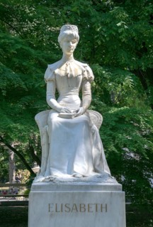 Empress Elisabeth of Austria Monument in white marble on the summer promenade of Merano, South