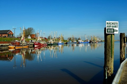Fishing boat in Greetsiel cutter harbour, Krummhörn, East Frisia, Lower Saxony