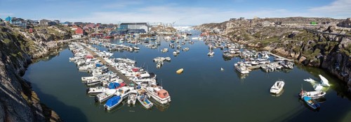 Ilulissat, Greenland, July 03, 2018: Panoramic view of the harbor in Ilulissat, North America