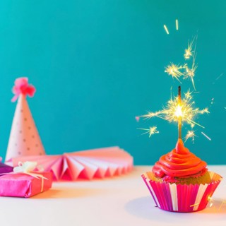 Close up cupcake with burning sparkler