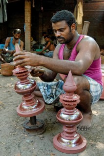Engraver making copper gopura kalasam in Kumbakonam, Tamil Nadu, India, Asia