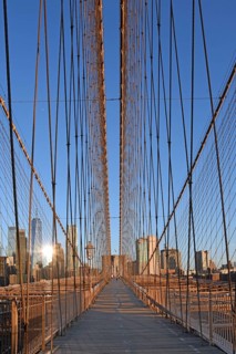 View in flight from cable stays of the Brooklyn Bridge, deserted in the morning, Brooklyn Bridge