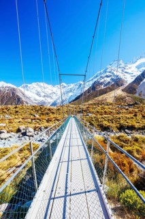 The iconic half day world famous Hooker Valley Track hike at Mt Cook in New Zealand