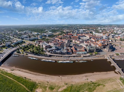 Large panorama drone shot, photo from above, aerial view, historical old town with sights,