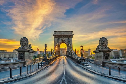 Budapest Hungary, city skyline sunrise at Chain Bridge with famous lion statue
