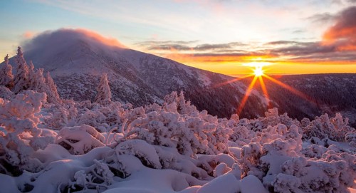 Winter sunrise in the Karkonosze Mountains with a view of Sniezka peak. Karkonosze National Park,