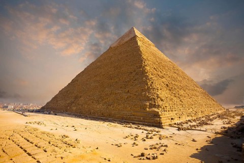 A beautiful fiery sky behind the Giza pyramid of Khafre in Cairo, Egypt, Africa