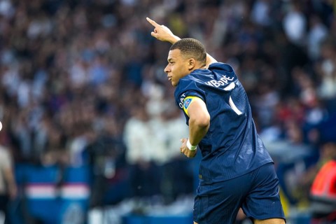 Football match, captain Kylian Mbappe' Paris St Germain has just scored 1-0 for Paris St Germain,