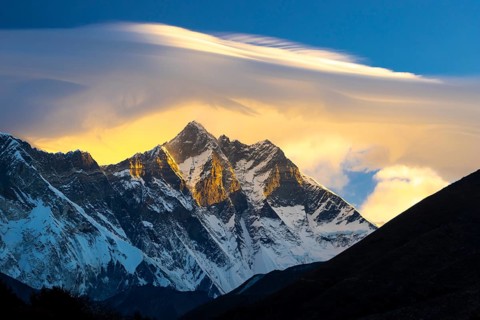 South Face of the eight-thousander Lhotse, with a lenticular cloud above its summits, viewed at